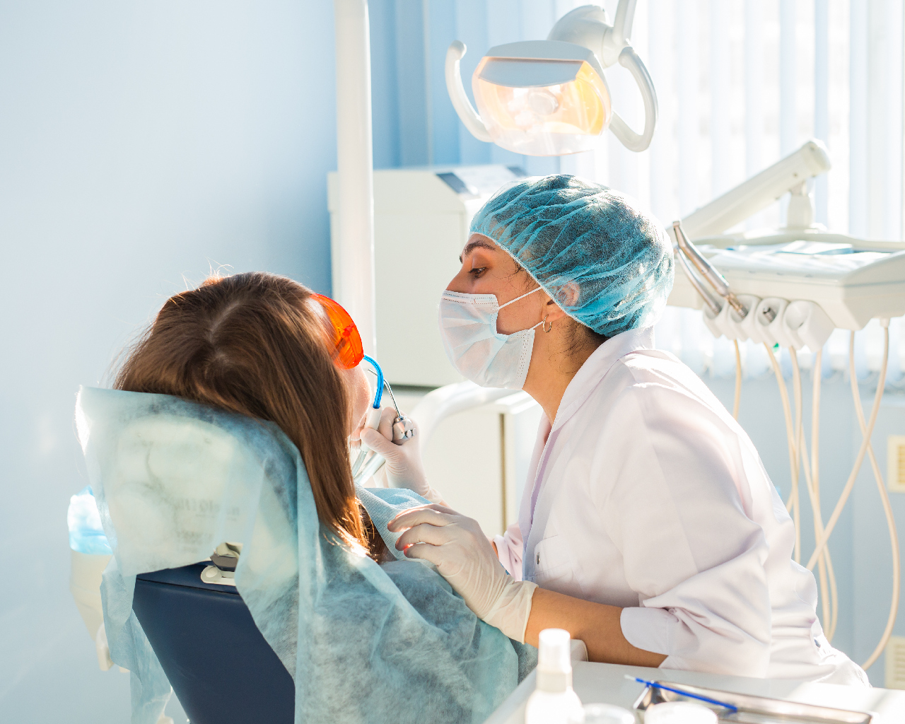 lad dentist using invisalign itero intraoral scanner