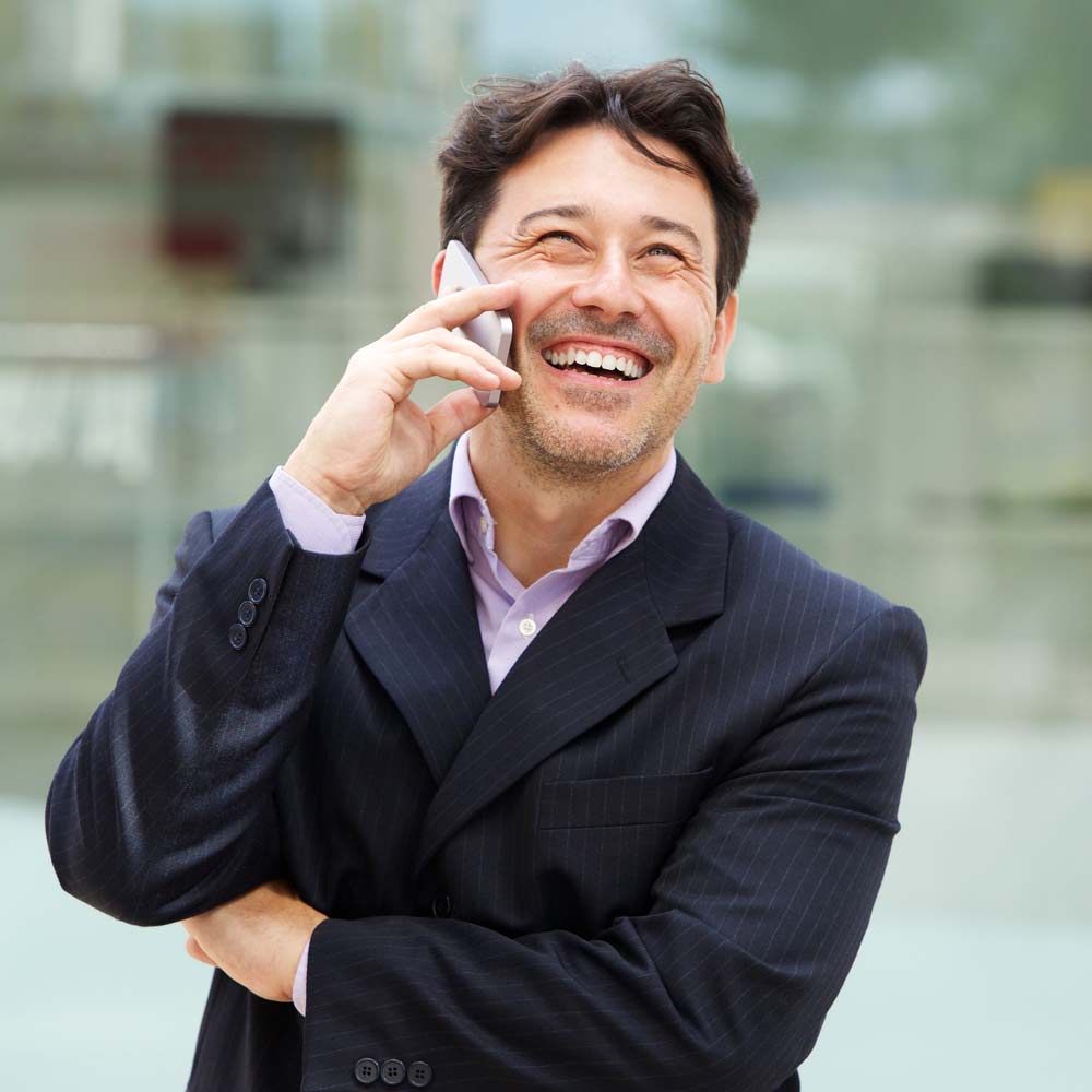 confident business man with dental bridge