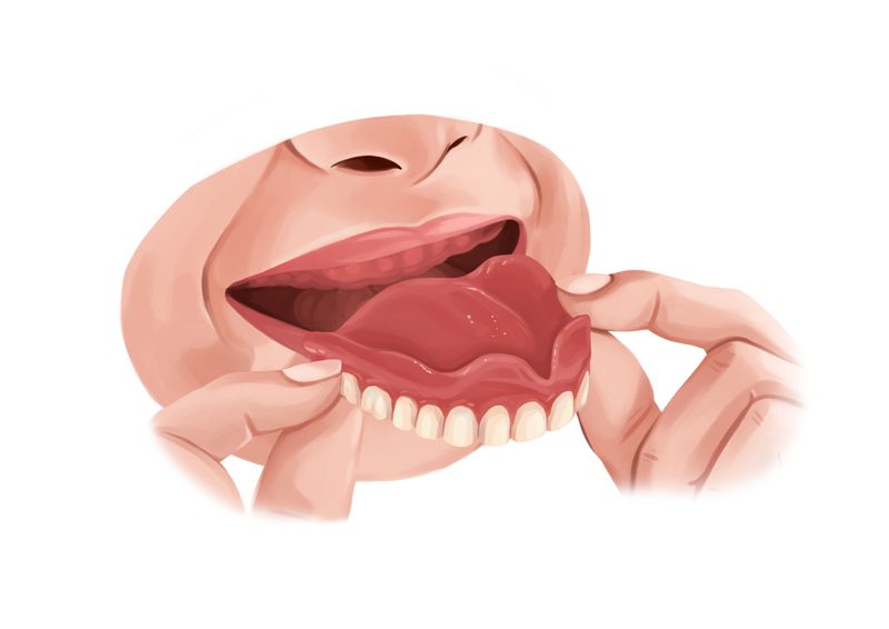 person putting on denture